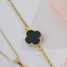 PULSEIRA DOURADA TREVO PRETO INSPIRAÇÃO