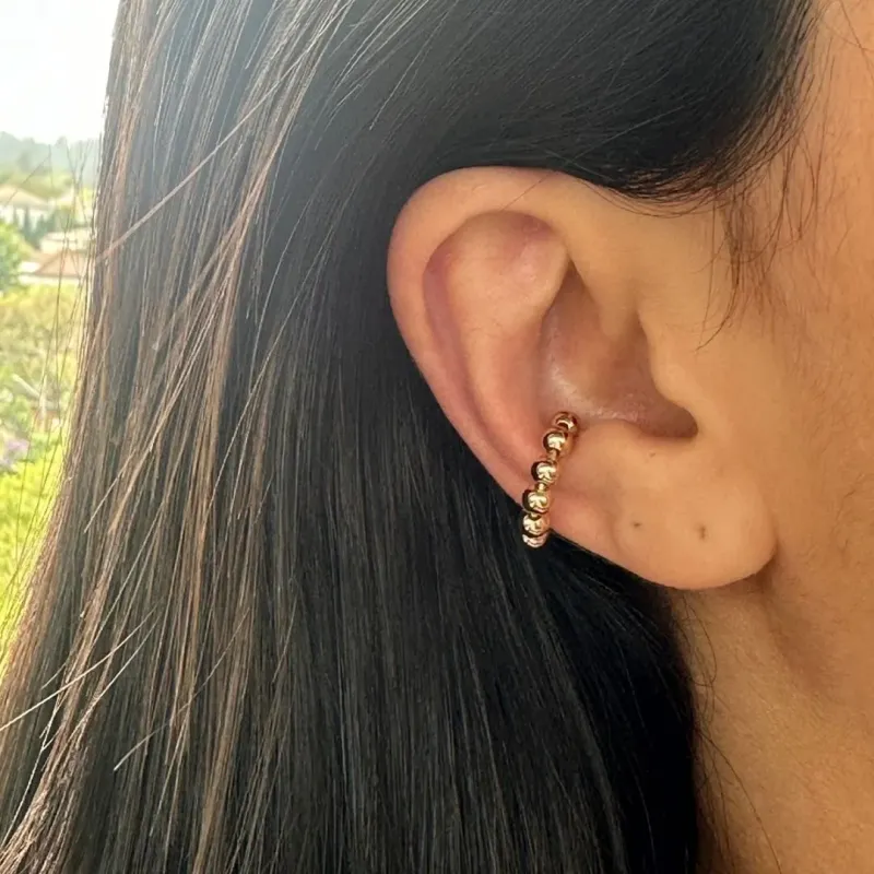 BRINCO DOURADO PIERCING FAKE BOLINHAS