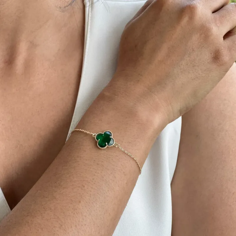 PULSEIRA DOURADA TREVO VERDE ESMERALDA INSPIRAÇÃO