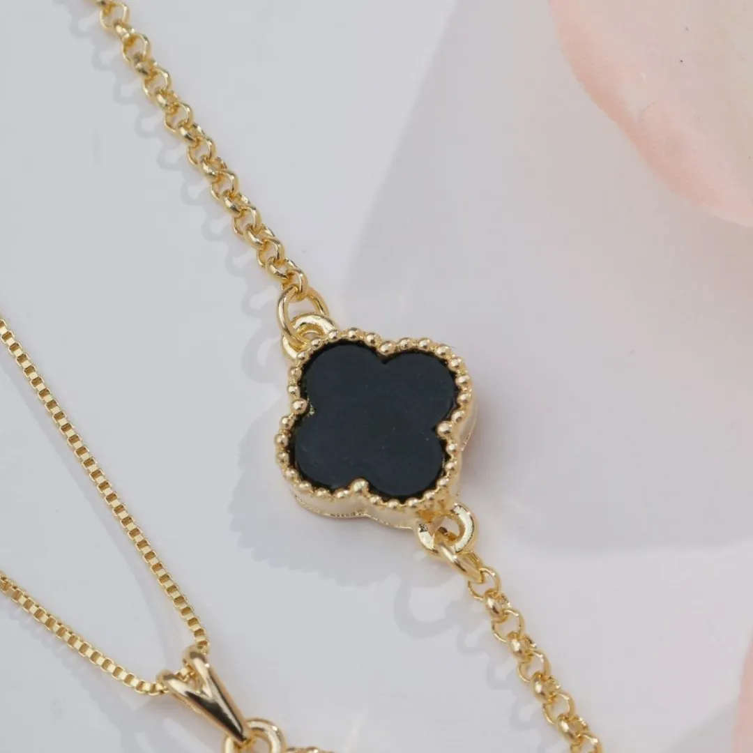 PULSEIRA DOURADA TREVO PRETO INSPIRAÇÃO